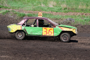 Image showing Race for survival. Green yellow car