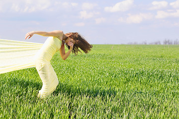 Image showing Expressive flexible young woman