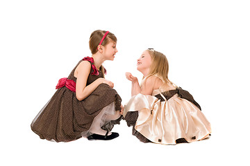 Image showing Two beautiful little girls talking