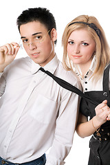 Image showing Portrait of smiling playful student pair. Isolated
