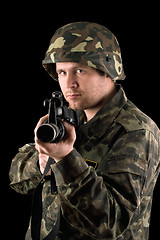 Image showing Watchful soldier with m16