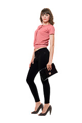 Image showing Young woman in a black leggings. Isolated