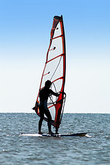 Image showing Silhouette of a man windsurfer