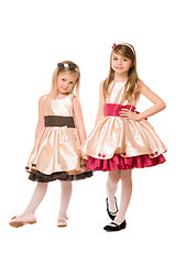 Image showing Two cute little girls in a dress