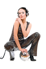 Image showing Young brunette in headphones