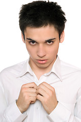 Image showing Portrait of handsome young man in a white shirt