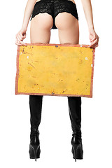 Image showing Sexy woman with yellow vintage board