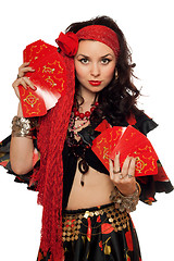 Image showing Portrait of gypsy woman with cards. Isolated