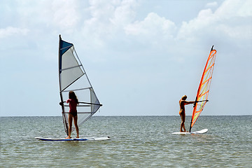 Image showing Two girls windsurfers