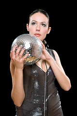 Image showing Portrait of young brunette with a mirror ball