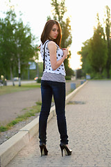 Image showing woman standing on the sidewalk