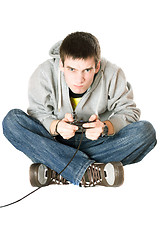 Image showing Guy with a joystick for game console