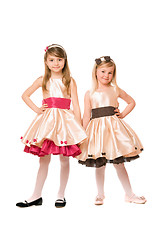 Image showing Two beautiful little girls in a dress