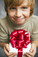 Image showing Boy holding present box