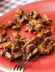 Image showing beef on red plate