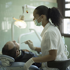 Image showing Female dentist during a stomatological procedure