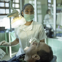 Image showing Latina dental nurse and patient