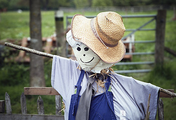 Image showing Stylish scarecrow with tie and hat