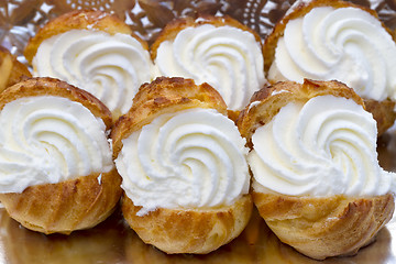 Image showing closeup of some profiteroles, lionesas