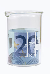 Image showing Twenty euro banknote in white beaker