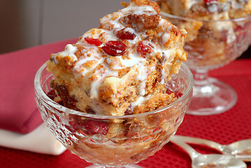 Image showing Closeup of two crystal goblets filled with Italian Panettone cra