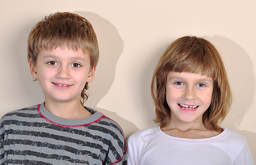 Image showing happy smiling elementary age boy and girl