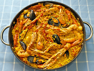 Image showing Paella Valenciana, typical food of Spain
