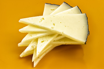 Image showing some slices of manchego cheese