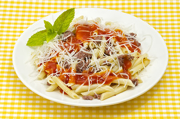 Image showing Traditional macaroni pasta with tomato grated cheese