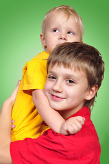 Image showing brothers hugging