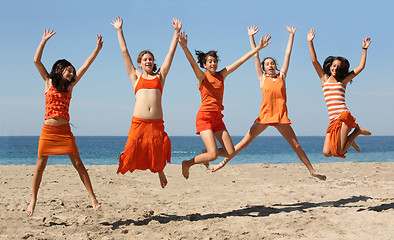 Image showing Five girls jumping