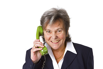 Image showing Female senior boss on telephone