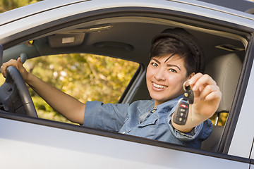 Image showing Happy Mixed Race Woman in Car Holding Keys