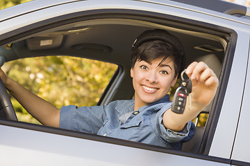 Image showing Happy Mixed Race Woman in Car Holding Keys