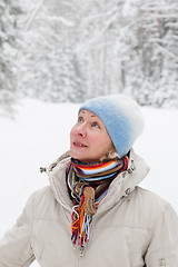 Image showing Portrait of a middle-aged woman in winter in the forest