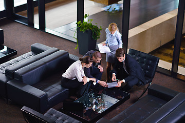 Image showing business people in a meeting at office