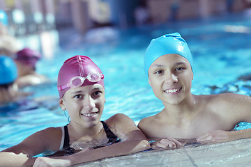 Image showing happy children group  at swimming pool