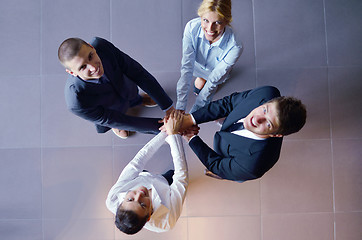 Image showing business people group joining hands