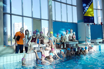 Image showing happy children group  at swimming pool