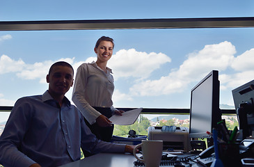 Image showing business people in a meeting at office