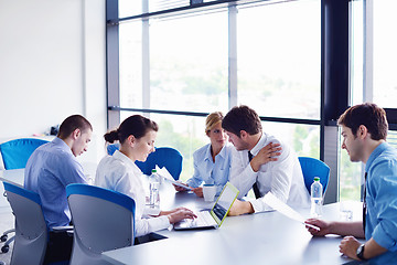 Image showing business people in a meeting at office