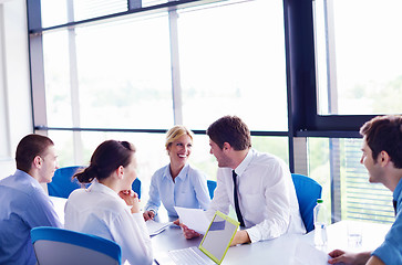 Image showing business people in a meeting at office