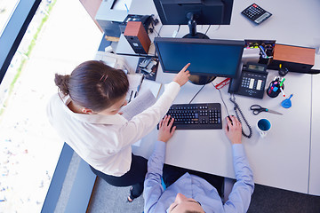 Image showing business people in a meeting at office