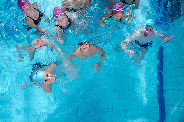 Image showing happy children group  at swimming pool