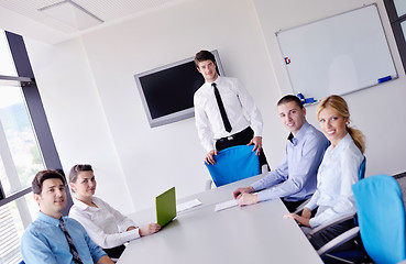 Image showing business people in a meeting at office