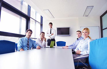 Image showing business people in a meeting at office