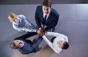 Image showing business people group joining hands