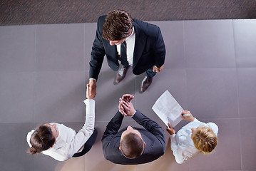 Image showing business people group joining hands