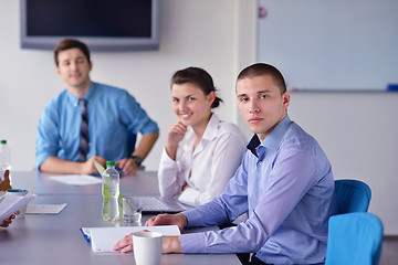 Image showing business people in a meeting at office