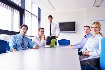 Image showing business people in a meeting at office